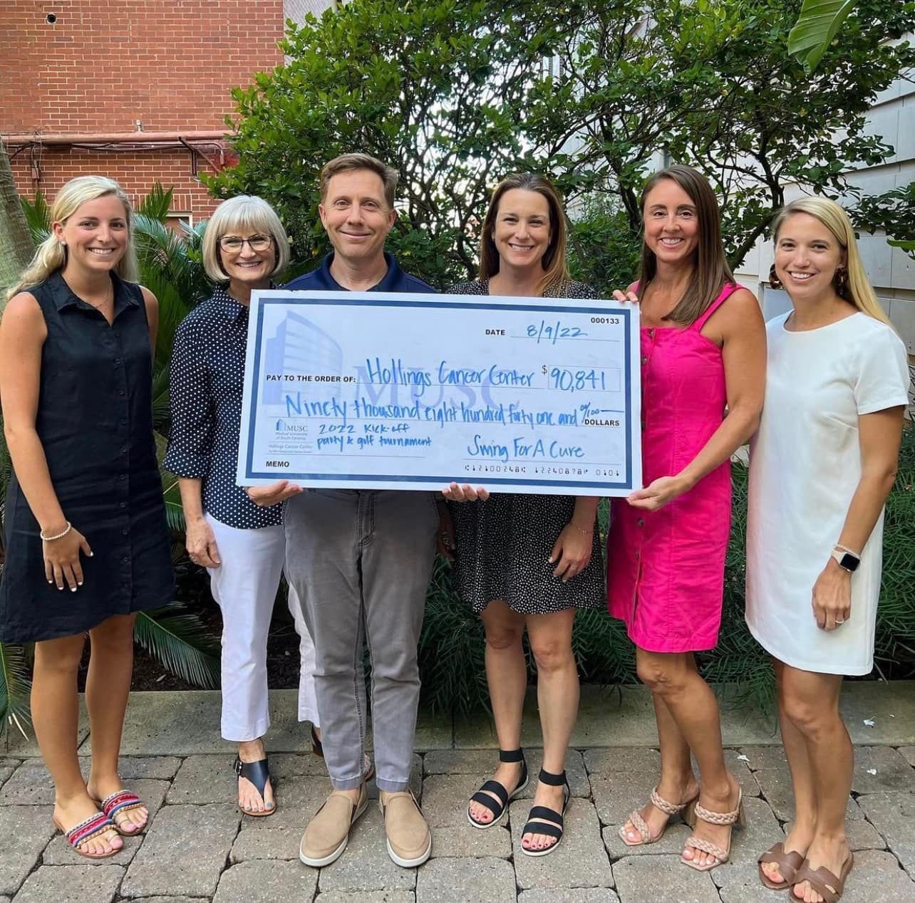 Swing for a Cure check presentation