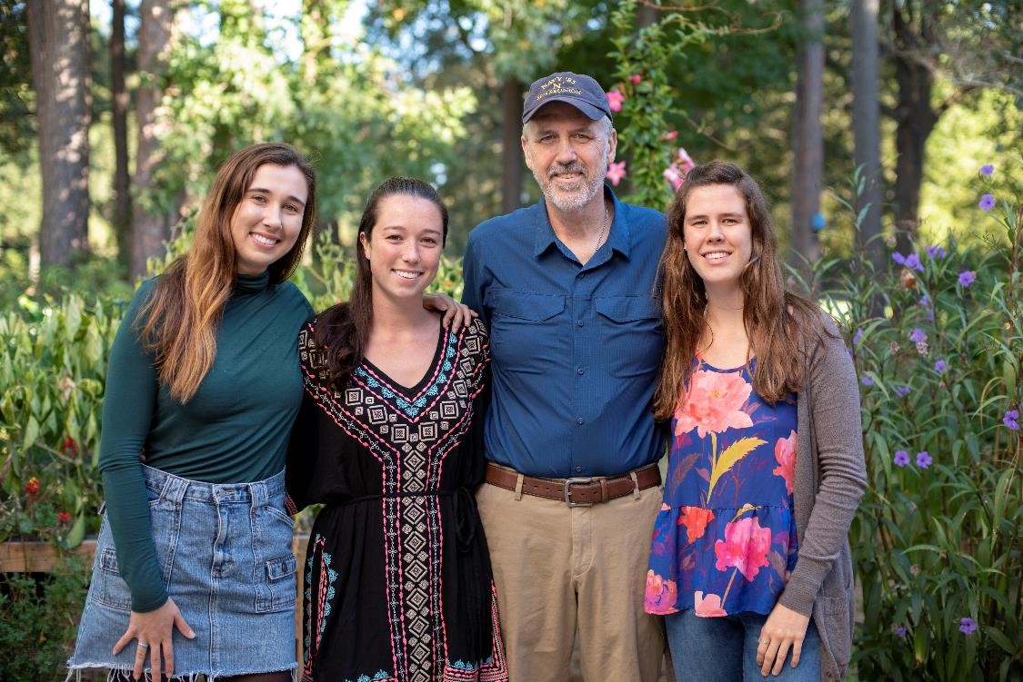 Joe Coen with his three daughters 